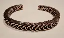 Bracelet manchette en cuivre – tresse sculptée, relief profond